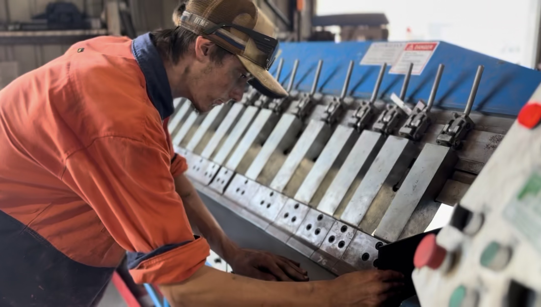 Press brake folding steel inside the Off Tap Metal Fabrication workshop in Ipswich QLD
